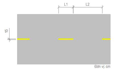 Vạch 1.1 – Vạch phân chia hai chiều xe chạy (vạch tim đường), dạng vạch đơn, đứt nét